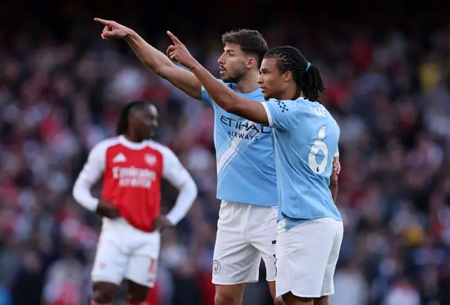 Ruben Dias and Nathan Ake