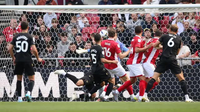 Nik Prelec of Oxford United scores