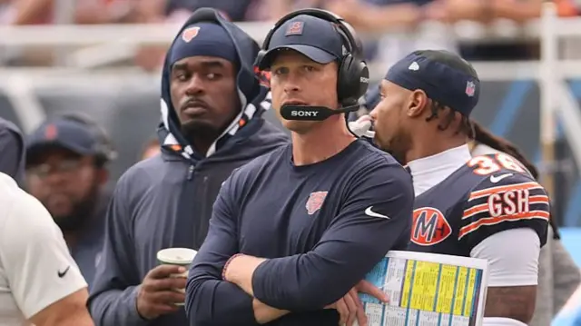 Chicago Bears head coach Ben Johnson watching his team play the Dallas Cowboys
