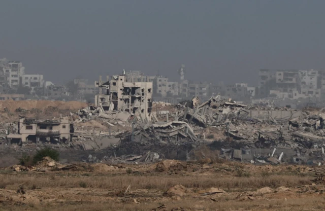 Destroyed buildings in Gaza, as seen from Israeli side of the Israel-Gaza border, in Israel