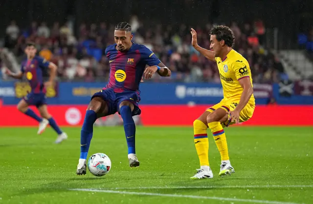 Raphinha dribbles the ball
