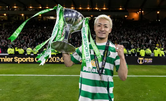 Daizen Maeda with the League Cup trophy