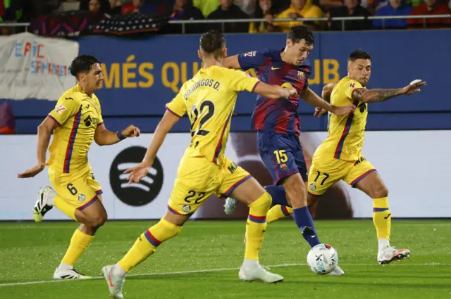 Christensen dribbles the ball forward