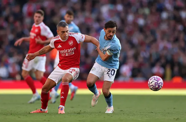 Leandro Trossard and Bernardo Silva