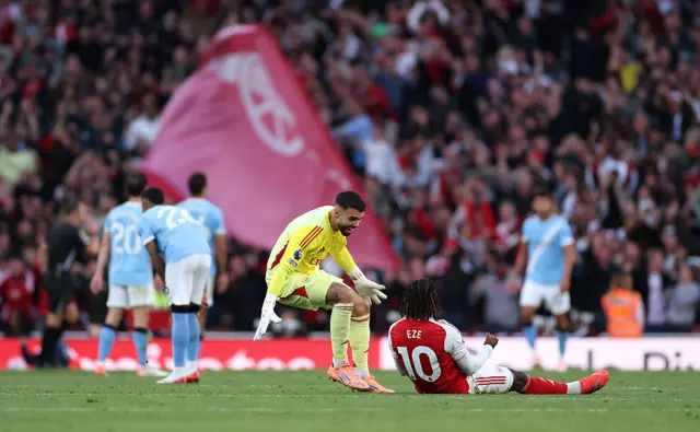 David Raya and Eberechi Eze celebrate