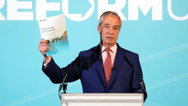 Reform UK leader Nigel Farage speaking at a lectern against an aquamarine background holding a document entitled Prioritising UK Citizens