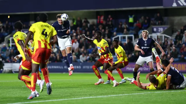 Jake Cooper of Millwall with a header on goal