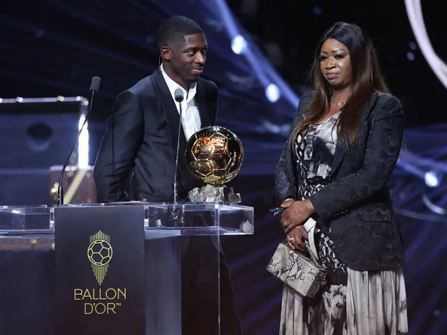 Dembele on stage with his mum