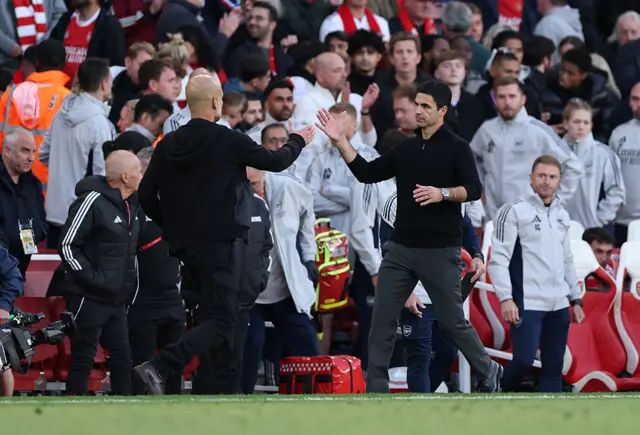 Pep Guardiola and Mikel Arteta shake hands