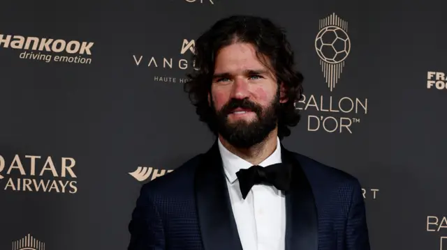 Alisson Becker arrives in Paris