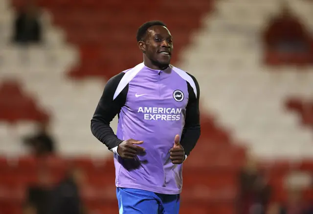 Welbeck warms up