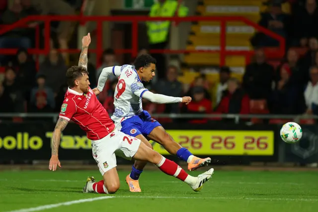 Doyle shoots at goal under pressure