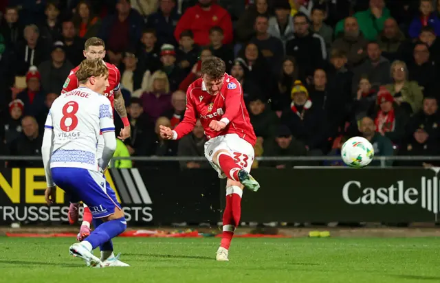 Nathan Broadhead fires at goal