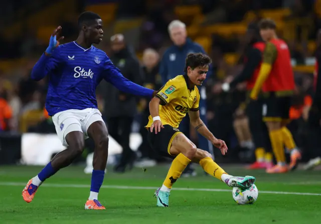 Thierno Barry pulls an opponent's shirt