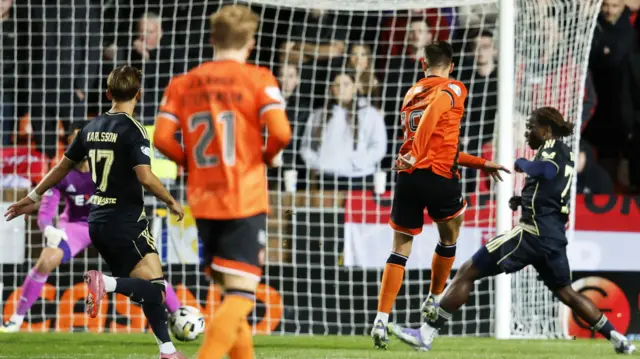 Ivan Dolcek scores for Dundee United against Aberdeen