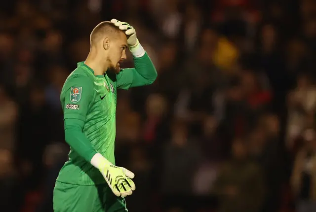 Jorgensen puts his hand to his head
