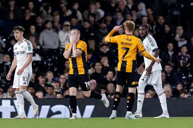 Shayne Lavery covers his mouth in disbelief