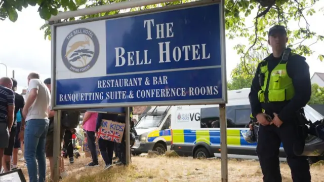 Police outside the Bell Hotel in Epping, Essex during a protest. There have been a number of demonstrations outside the hotel, believed to be housing asylum seekers, since police charged 38-year-old asylum seeker Hadush Gerberslasie Kebatu with sexual assault following an incident where he is alleged to have attempted to kiss a 14-year-old girl