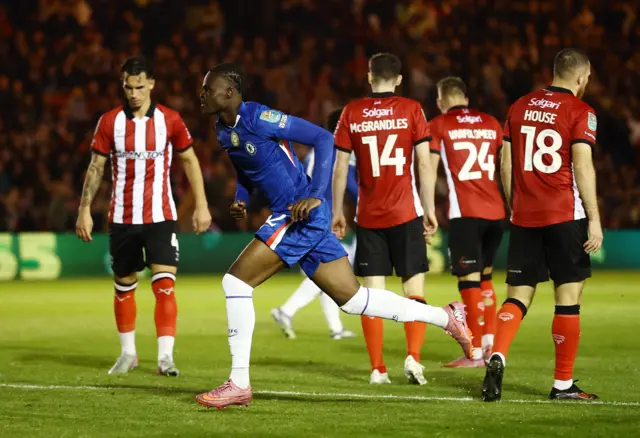 George runs to celebrate after equalising