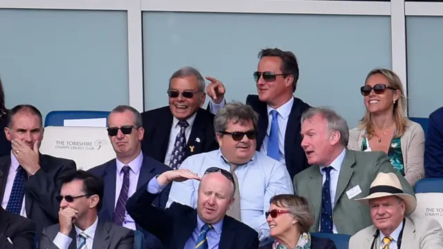 Yorkshire CC president Harold 'Dickie' Bird enjoys a joke with Prime Minister David Cameron (c) during the 4th Royal London One-Day International match between England and Australia at Headingley on September 11, 2015 in Leeds, United Kingdom