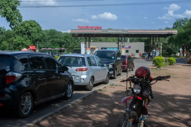 Cars queue for fuel at a petrol station in Lilongwe in November 2024.