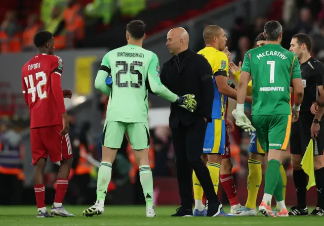 Slot and co shake hands at full time