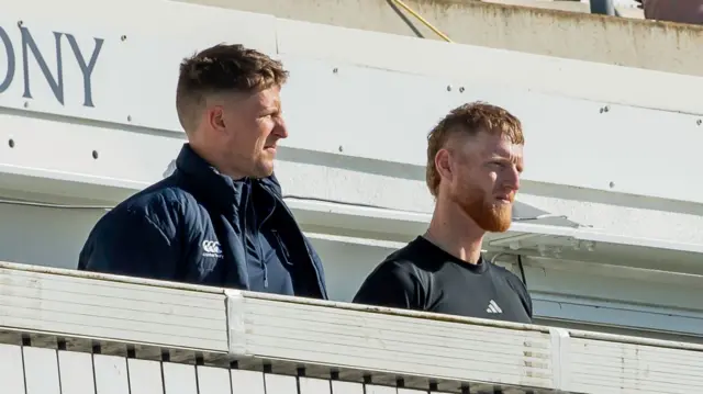Brydon Carse and Ben Stokes