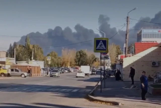 This screengrab from a street in the city shows a dense cloud of smoke coming from the Gazprom refinery