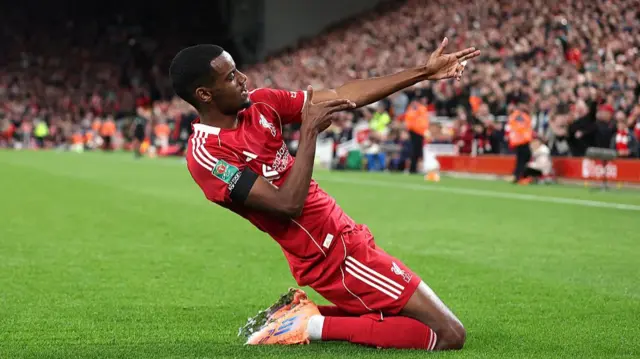 Alexander Isak celebrates scoring his first goal for Liverpool