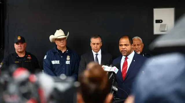 Mayor of Dallas Eric Johnson (R) speaks during a press conference following a shooting at a US Immigration and Customs Enforcement (ICE) detention facility in Dallas, Texas