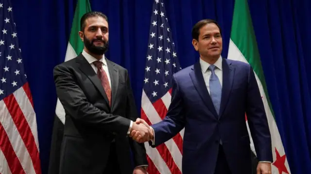US Secretary of State Marco Rubio (right) shakes hands with Syrian President Ahmad al-Sharaa in New York on Monday