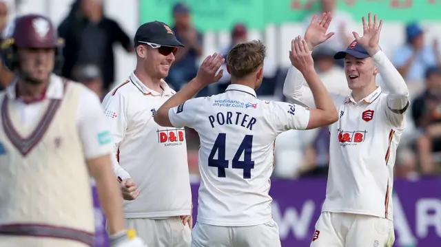 Jamie Porter celebrates taking a wicket