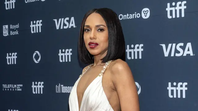 Kerry Washington in a white dress on the red carpet