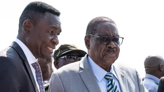 Peter Mutharika on the right