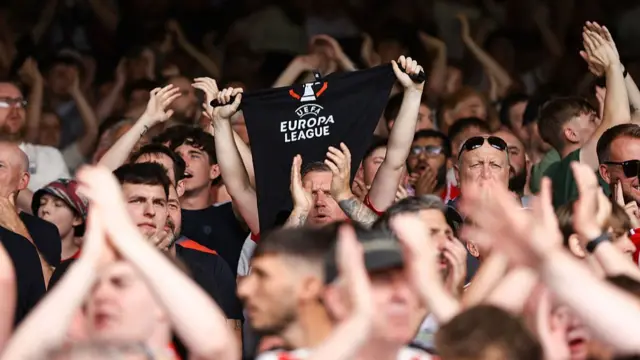 Nottingham Forest fans hold up a Europa League sign
