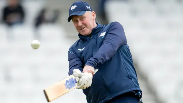Yorkshire coach Anthony McGrath hits a ball
