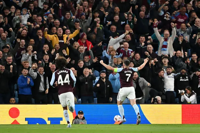 John McGinn celebrates after scoring for Aston Villa against Bologna at Villa Park