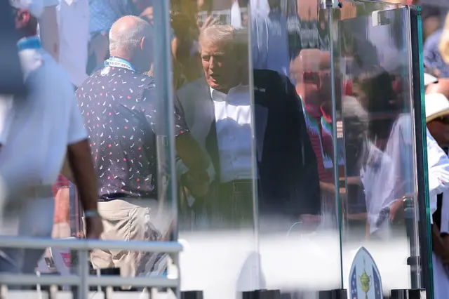 Donald Trump in his glass box