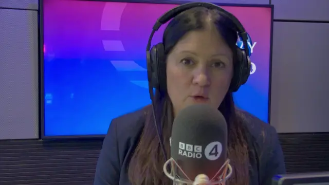 Close up of Lisa Nandy speaking in studio. In front of her a black desk mic marked with the BBC Radio 4 branding,