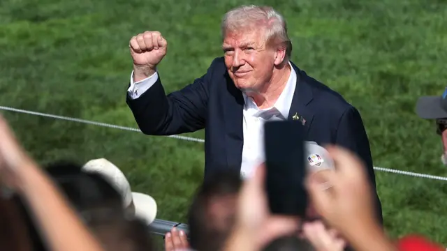 Donald Trump salutes the crowd