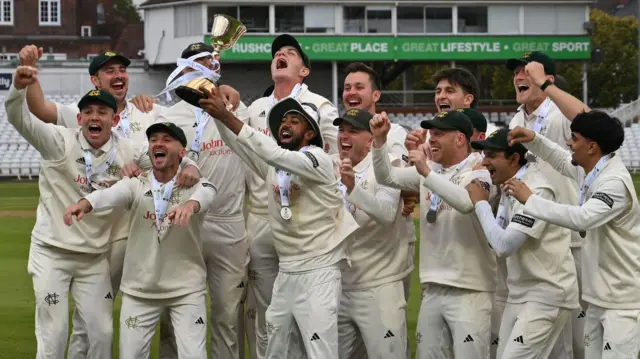 Notts players celebrate with County Championship trophy