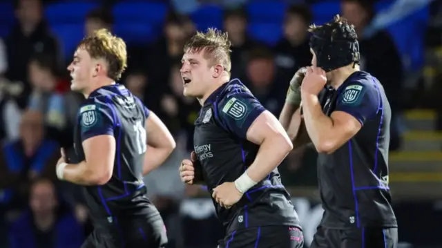 Johnny Matthews celebrates