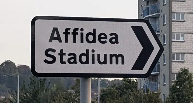 A signpost showing Affidea Stadium