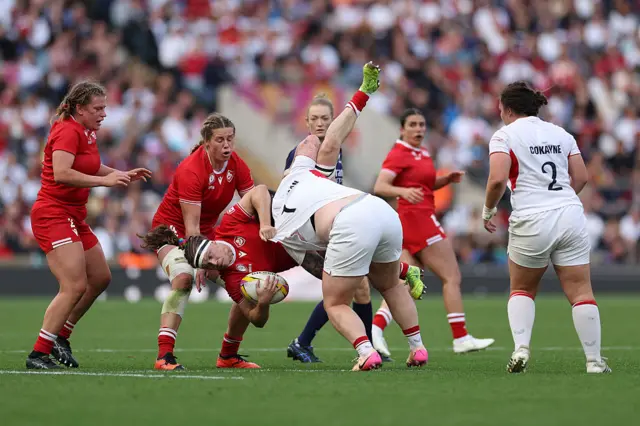England's prop Hannah Botterman makes an illeagal tackle