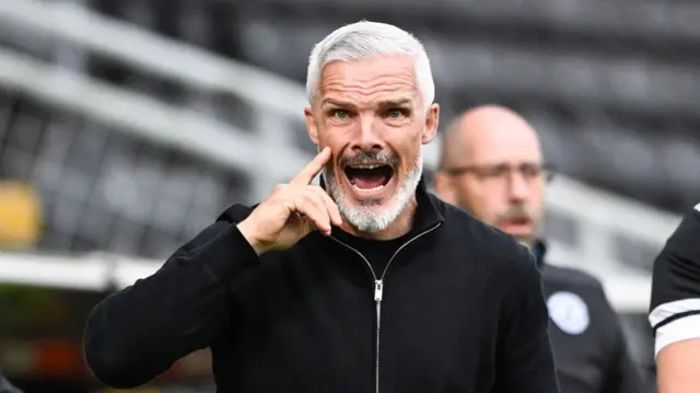 Jim Goodwin shouts