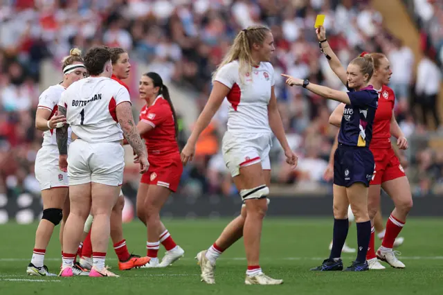 England's prop Hannah Botterman makes an illeagal tackle