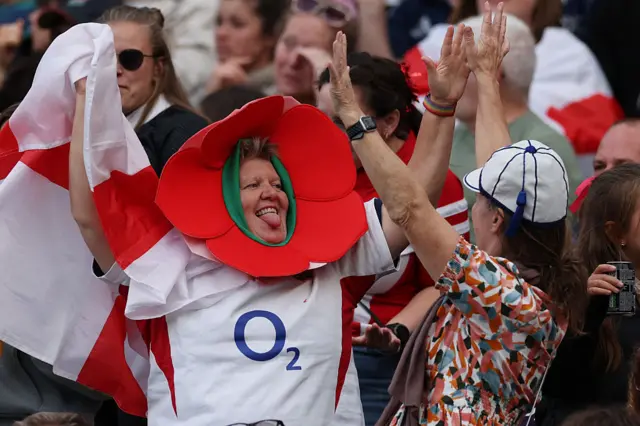 England supporters cheer