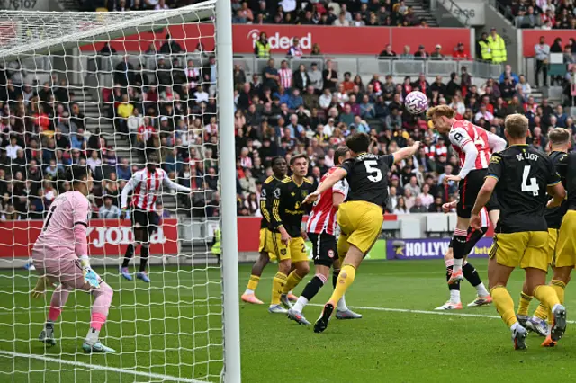 Sepp Van den Berg has this headed attempt saved