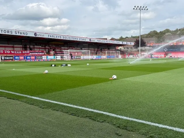 Sprinklers on the Accrington pitch ahead of the match