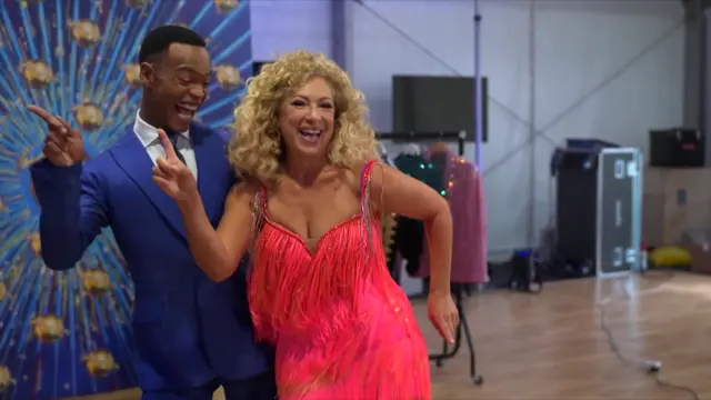 Alex Kingston dances backstage of the Strictly set.